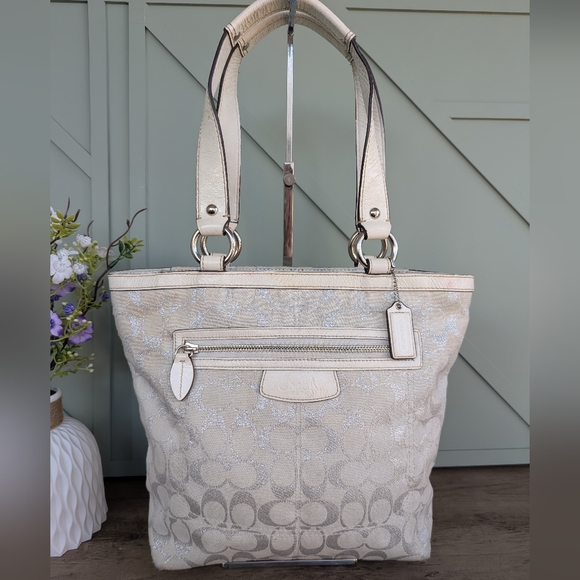 Coach Handbags - Coach Penelope Signature Lunch Tote, typically identified by